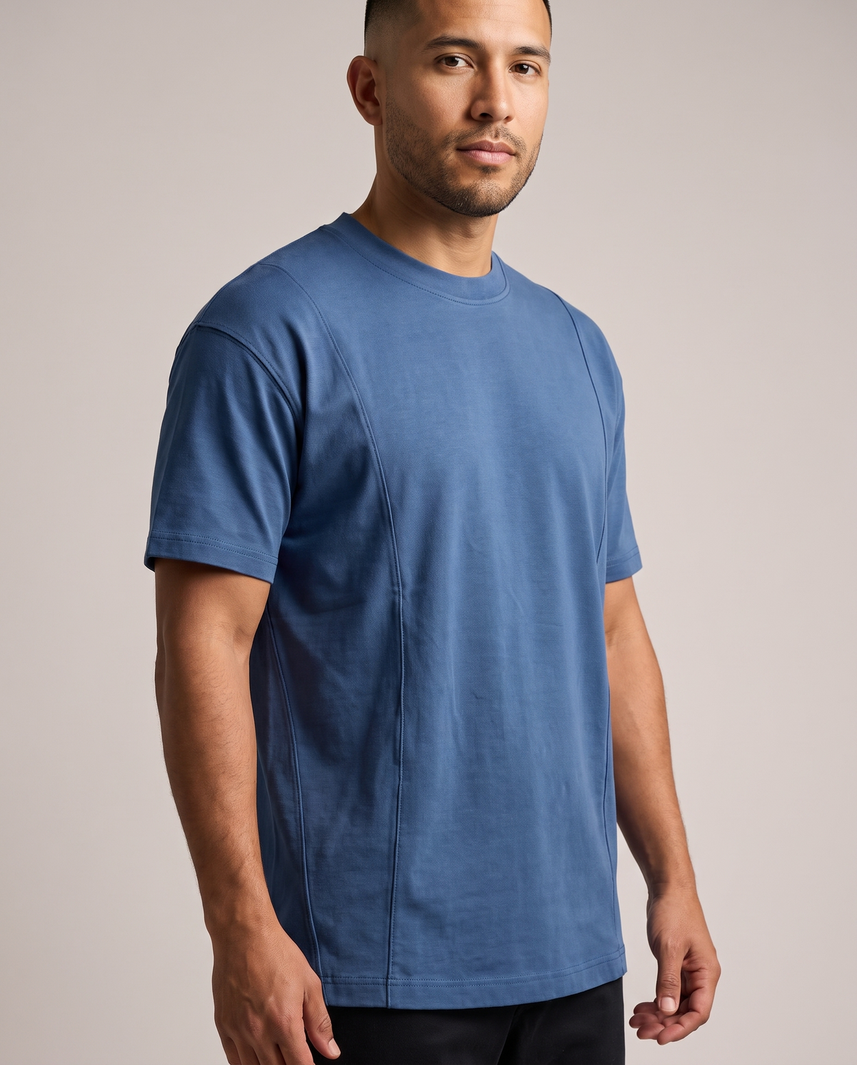 Segment Panel Crew Tee in Blue, close-up of the panel seams on a model