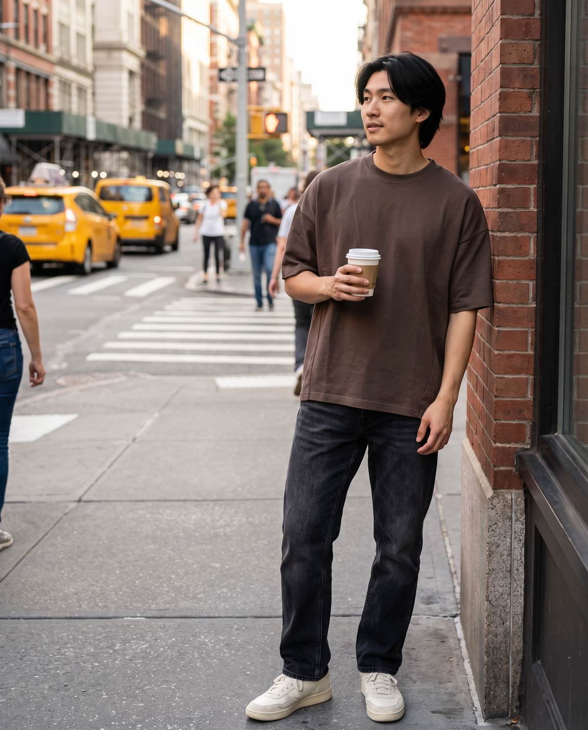 Segment Panel Crew Tee in Brown, street shot on a model