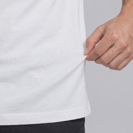 City Wordmark Tee in White, fabric stretch close-up video