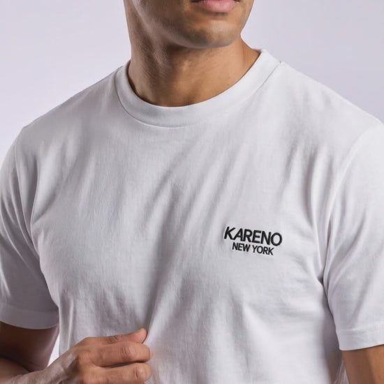 Borough Emblem Crew Tee in White, chest emblem close-up video