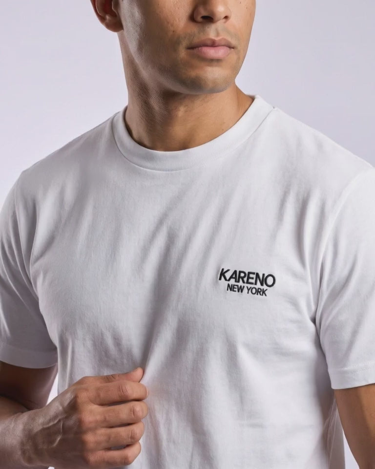 Borough Emblem Crew Tee in White, chest emblem close-up video