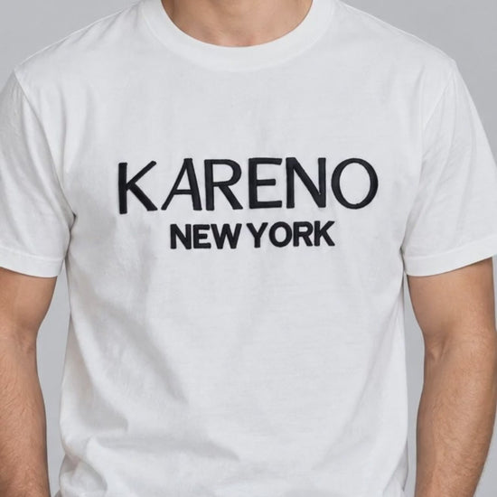 City Wordmark Tee in White, chest print close-up video