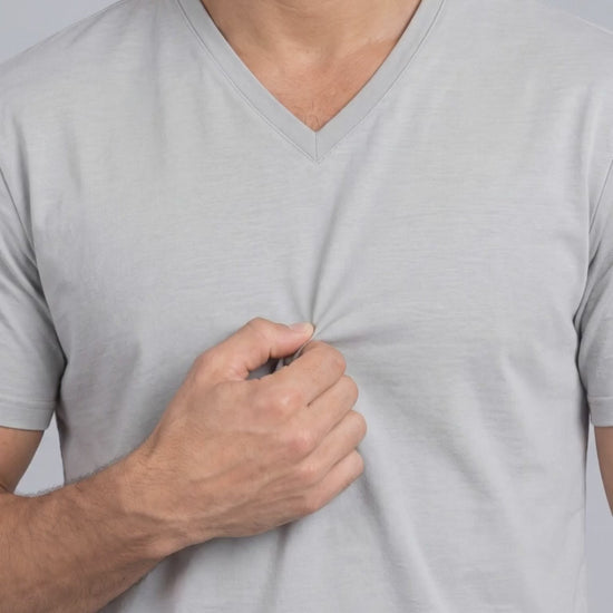 Clean Angle V-Neck Tee in Cream, fabric stretch close-up video